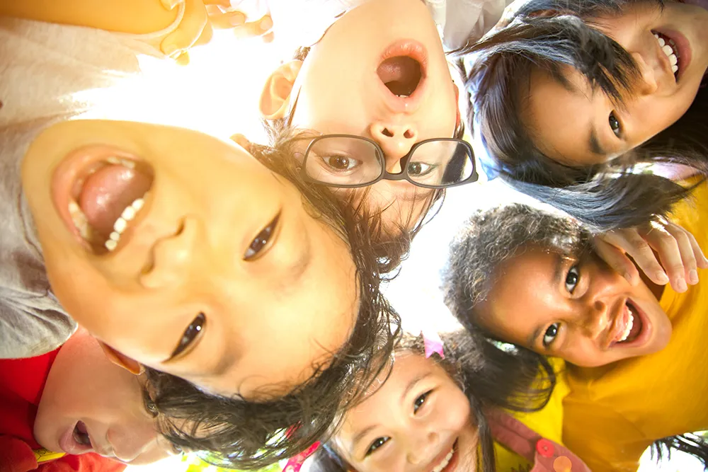 closeup Multi-ethnic group of school children face